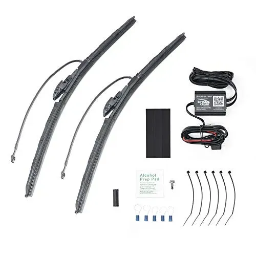 Crystal Clear automatic heated windshield wiper blades melting snow and ice for visibility.